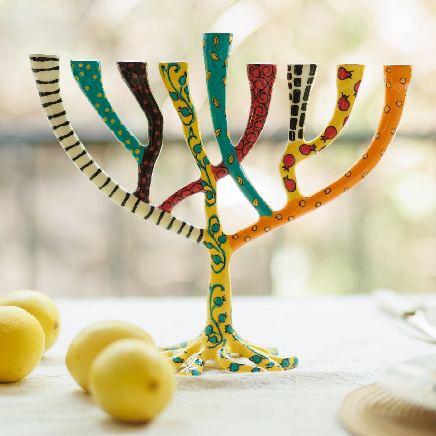 חנוכיות מעוצבות מאלומיניום יצוק צבוע באמייל עבודת יד - דגם The Wild Tree 